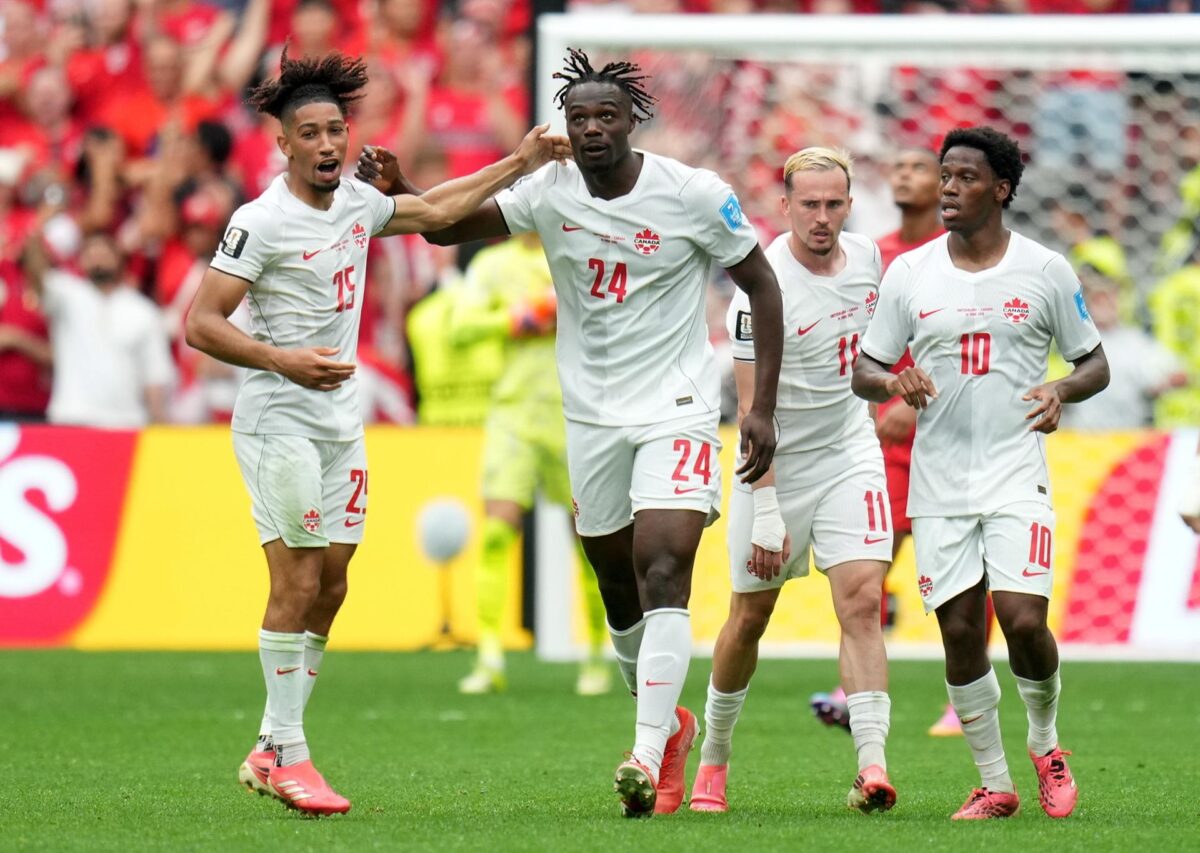 Promise David, de Canadá, celebra anotar el 2-1 durante el partido de la fase de grupos de la Copa Mundial de la FIFA. EFE/EPA/BOB FRID